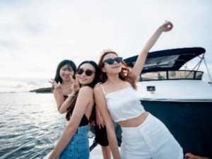 Group of friends celebrating a bachelorette party on a private yacht rental