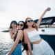 Group of friends celebrating a bachelorette party on a private yacht rental