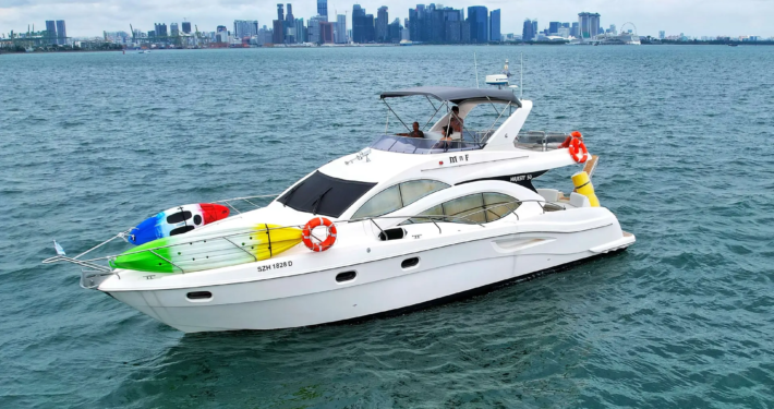 Luxury yacht cruising on blue waters, available for premium private charter bookings via Sing Yachts