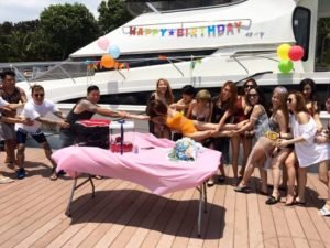 Birthday party celebration with decorations onboard a private charter yacht in Singapore